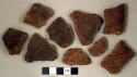 Coarse earthenware body sherds, incised, impressed, rocker dentate; stone fragment