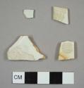 Refined white earthenware, some stained from deposition, possibly whiteware, creamware, and pearlware