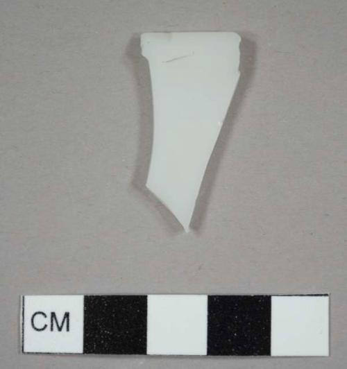 Opaque white rim fragment to an unidentified vessel