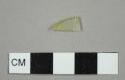 Flat glass fragment with yellow stain