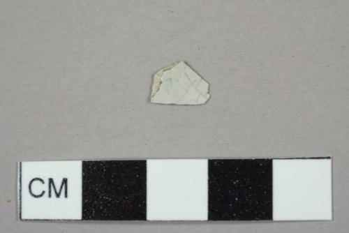 Burned, refined white earthenware sherd