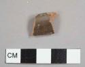 Lead-glazed red earthenware rim sherd to a hollowware vessel