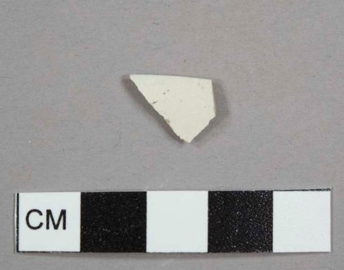 White, salt-glazed stoneware rim sherd to a hollowware vessel