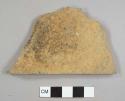 Stone fragment, possibly from a roof tile