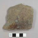 Stone, possibly a roof tile fragment