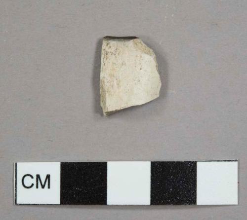 Kaolin/White ball clay pipe bowl fragment with burned interior