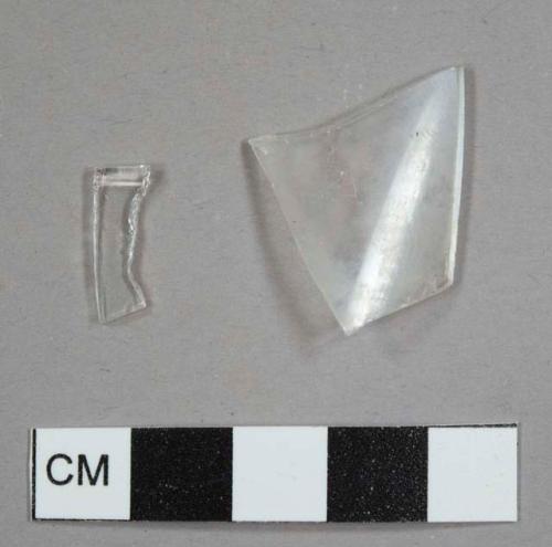 Colorless curved glass fragments, including one possible rim fragment