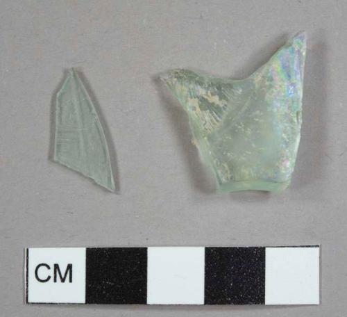 Aqua glass fragments, one curved and one flat