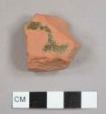 Slipped, lead-glazed red earthenware sherd