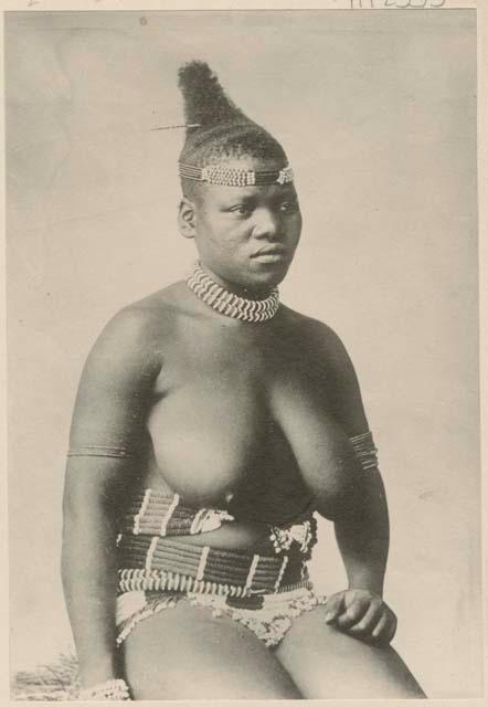 Studio portrait of a woman sitting