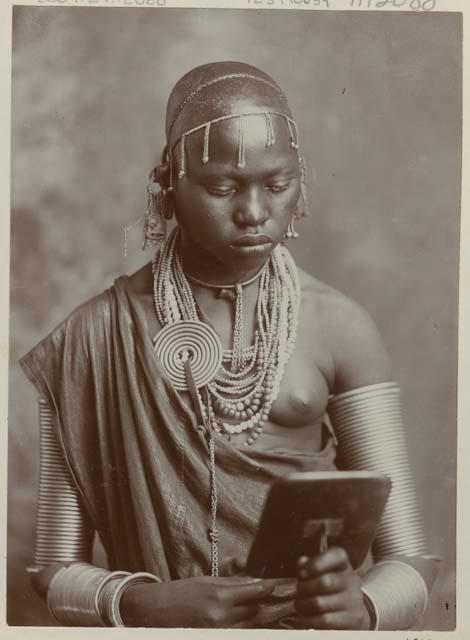 Studio portrait of a woman sitting