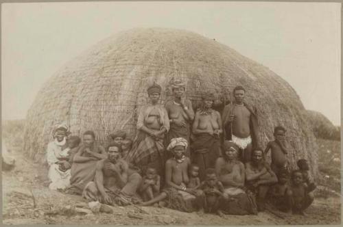 Group in front of a hut