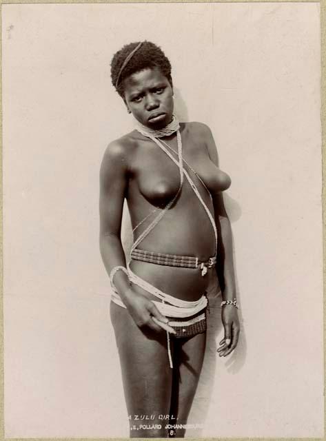 Studio portrait of girl standing