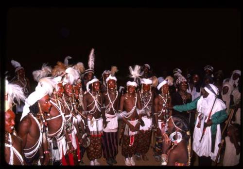 Line of Gerewol dancers at nighttime - Niger
