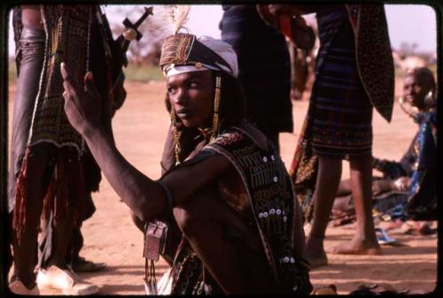 Gerewol dancer applying makeup - Niger
