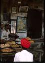 Man with red turban in shop - Pushkar, India
