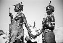 Hamar women holding hands - Ethiopia

