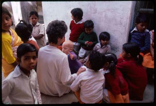 At Bose Foundation Saraswati Puja Adele and Caleb in crowd - Benares, India
