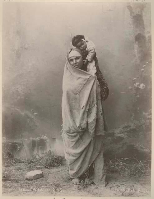 Woman carrying a baby