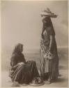 Two women with baskets