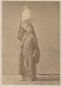 Woman carrying water jar