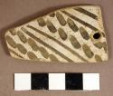 Ceramic sherd, worked, perforated, black on white linear design