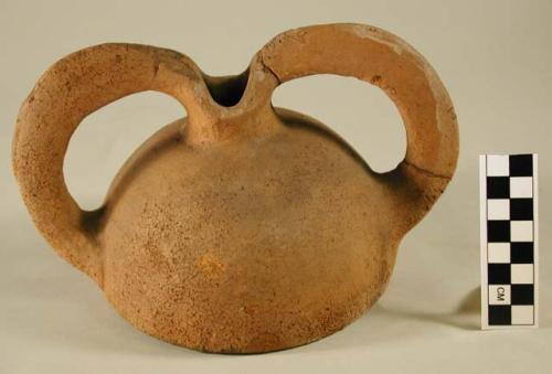 Kettle-shaped reddish pottery vessel - slender flaring handles