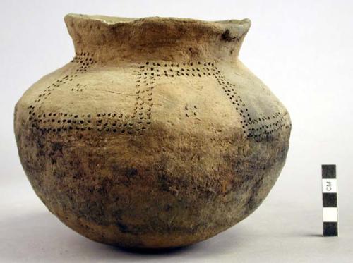 Shouldered pottery jar of plain ware - punctate design around shoulder