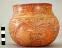 Yojoa polychrome pottery jar, dimpled base, 2 effigy heads in paint & low relief
