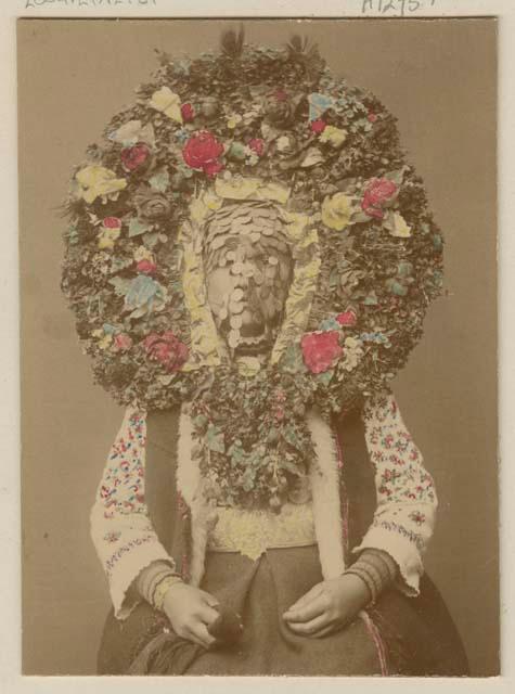 Studio portrait of woman wearing a headdress