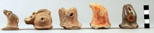 Pottery handles in bird and animal form