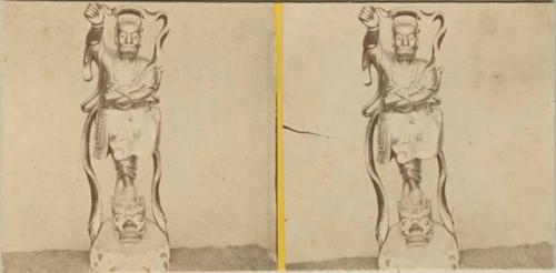 Stereoview of male Chinese figurine