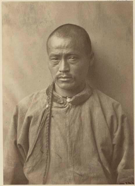 Portrait of Chinese man with long hair