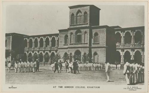 Men in uniform in front of Gordon College