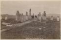 Men standing in stone circle