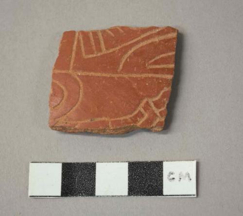 Red incised potsherd