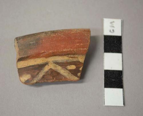 Cusipata white on red and black painted rim sherd