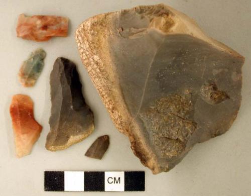 Chipped stone, including one core, chipping debris, prismatic blades, flakes and a bifacial preform