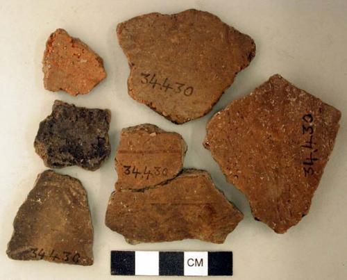 Ceramic, earthenware body sherds, incised and undecorated, one is mended