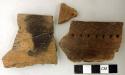 Ceramic, earthenware rim sherds, incised and punctate design; one sherd is mended with 34426