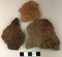 Ceramic, earthenware rim and body sherds, including undecorated, dentate, incised, and cord-impressed designs