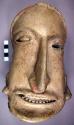 Head of large terra cotta human figure