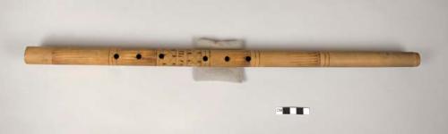 Bamboo flute with dark diamond shaped designs