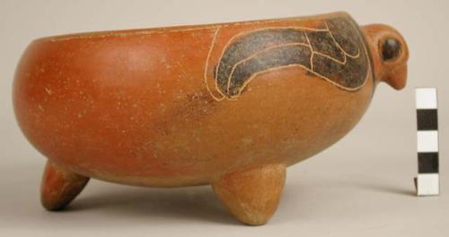 Redware vessel, tripod supports, effigy head (bird).