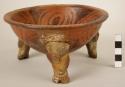 Small Carillo red and black tripod pottery vessel - incised rim (3 legs mended)