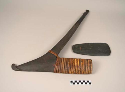 Ceremonial axe, lower part of handle restored