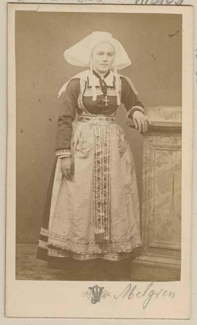 Studio portrait of a woman standing