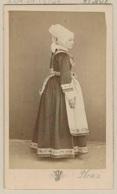 Studio portrait of a woman standing