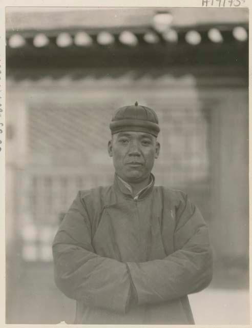 Portrait of male innkeeper wearing hat