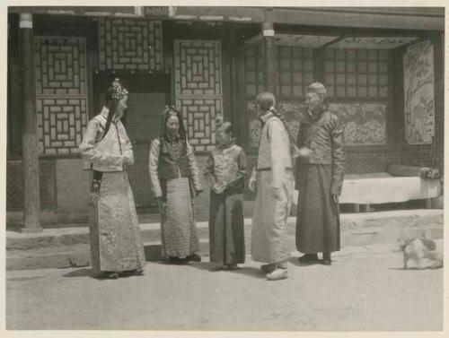 A Manchu bride and groom with bride's mother and two sisters